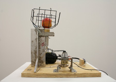 Prototype for a Machine that Inserts Razor Blades into Apples