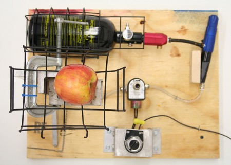 Prototype for a Machine that Inserts Razor Blades into Apples